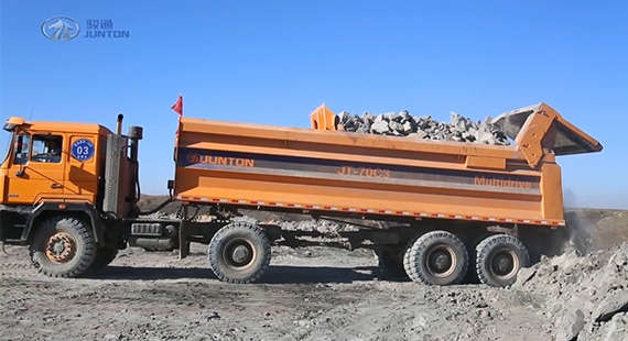 Multi-drive articulated mining truck